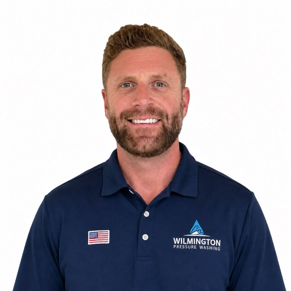 Cameron Falkner, owner of Wilmington Pressure Washing, in a company polo shirt